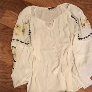 White three quarter length shirt